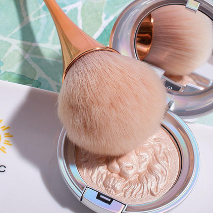 Rose gold pink makeup brush with elegant goblet handle and soft bristles