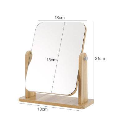 Large heart-shaped desktop mirror with clear glass reflection for makeup and grooming on a stable plastic base