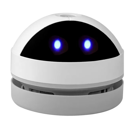 Compact Robot Desktop Vacuum cleaner in black with USB charging cable on a white surface
