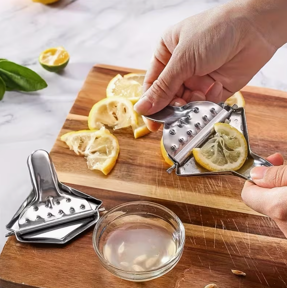 Stainless steel manual citrus juicer with ergonomic handle for easy juice extraction, ideal for home and garden use.