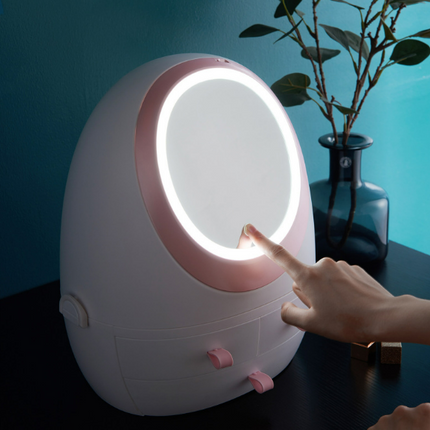 Egg shaped makeup storage box with built-in light and multiple compartments for organizing beauty essentials