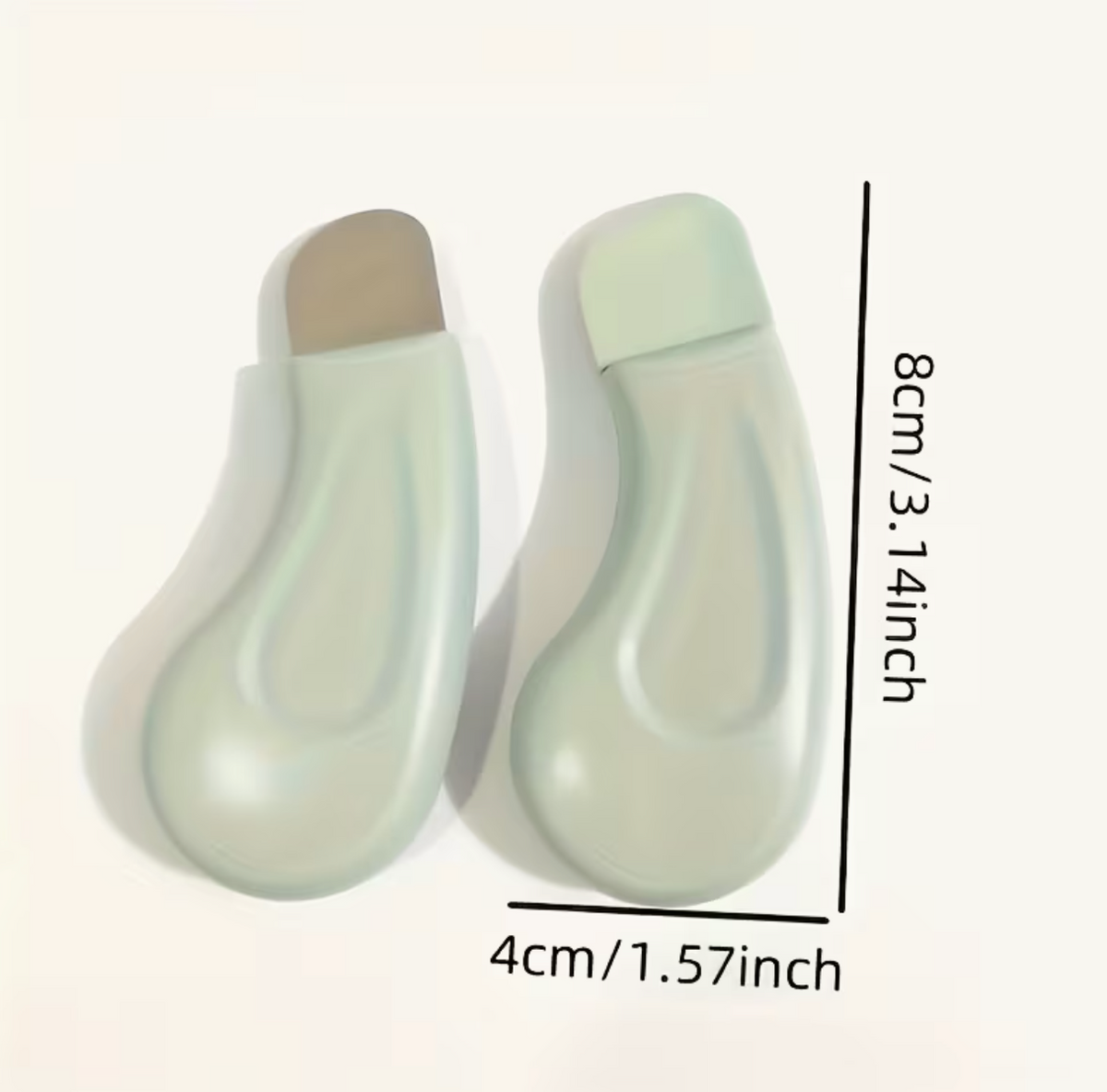 Light green textured facial pore cleanser brush with ergonomic handle, designed for blackhead removal and gentle skin cleansing.