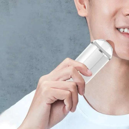 White electric mini shaver with floating cutter head and USB rechargeable compact design