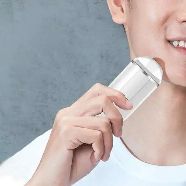 White electric mini shaver with floating cutter head and USB rechargeable compact design