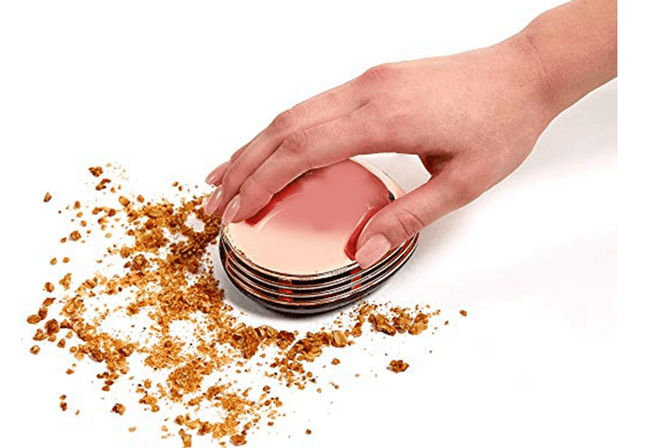 Compact gold portable mini desktop vacuum cleaner for table cleaning and dust removal