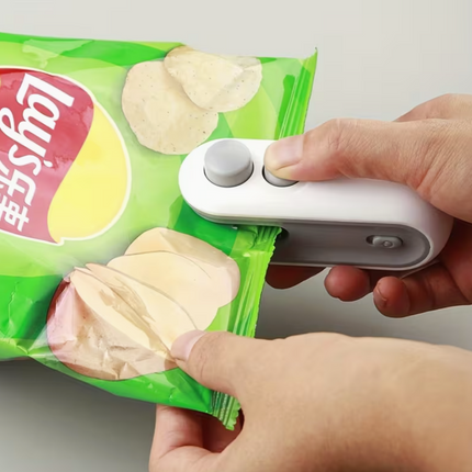 Portable USB rechargeable handheld bag sealer by UK Dropships, compact manual sealing machine for home and garden use.