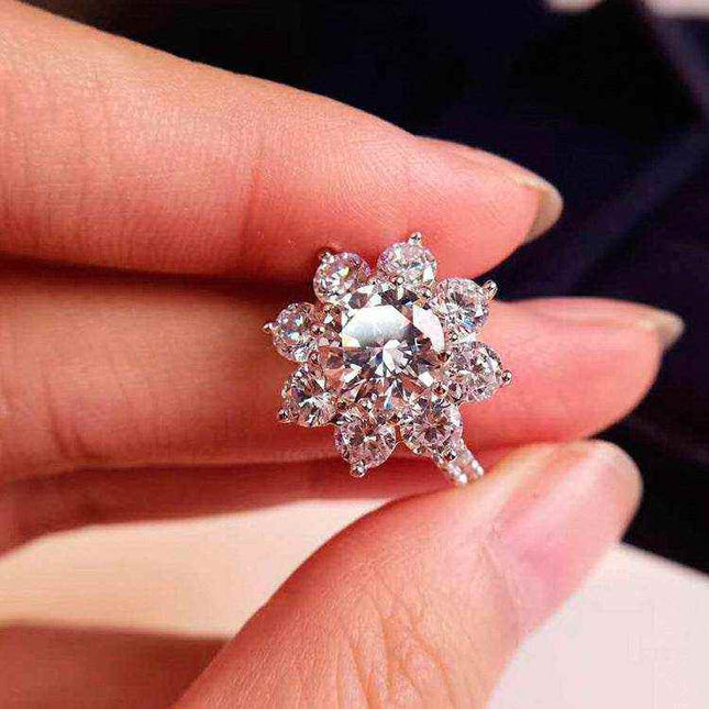2 karat high carbon diamond sunflower sterling silver ring with intricate design and brilliant center stone