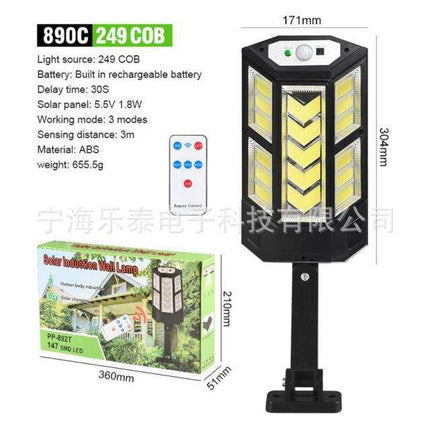 Outdoor solar wall light mounted on exterior wall with remote and motion sensor features