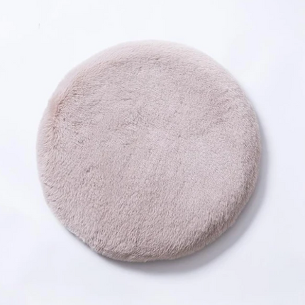 Plush faux fur memory foam cushion in blush pink enhancing comfort and decor style