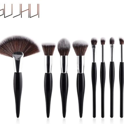 8-piece makeup brush set with black handles and silver tubes for professional makeup application