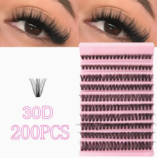 Close-up of individual eyelash clusters with D curl, 8-16mm length, wide stem, natural look, reusable DIY lash extension kit.