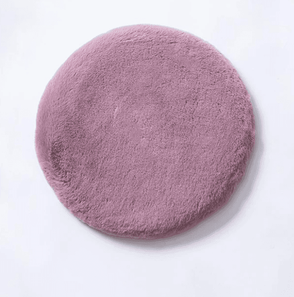 Plush faux fur memory foam cushion in blush pink for stylish comfort and support