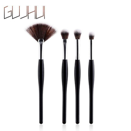 8-piece makeup brush set with black handles and silver tubes for professional makeup application