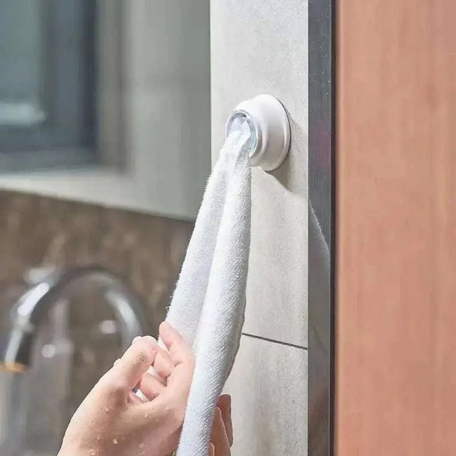 2pcs Creative Punch-Free Kitchen Towel Rack hooks installed on a kitchen wall holding towels