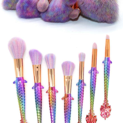 7-piece makeup brush set with yellow-green gradient handles and soft rayon bristles for face and eye makeup application