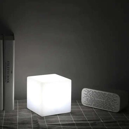 Rechargeable Cube LED Stool Table with remote control and 16 color options, portable and rechargeable lighting and seating solution