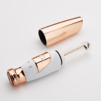 Compact gold-plated lipstick-style electric hair remover for women