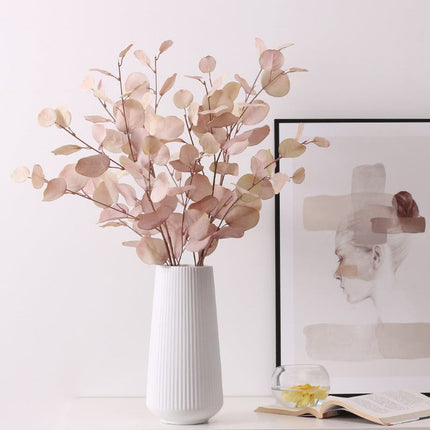 Realistic silk apple leaves simulation in autumn white, pink, and light blue for wedding photography decor