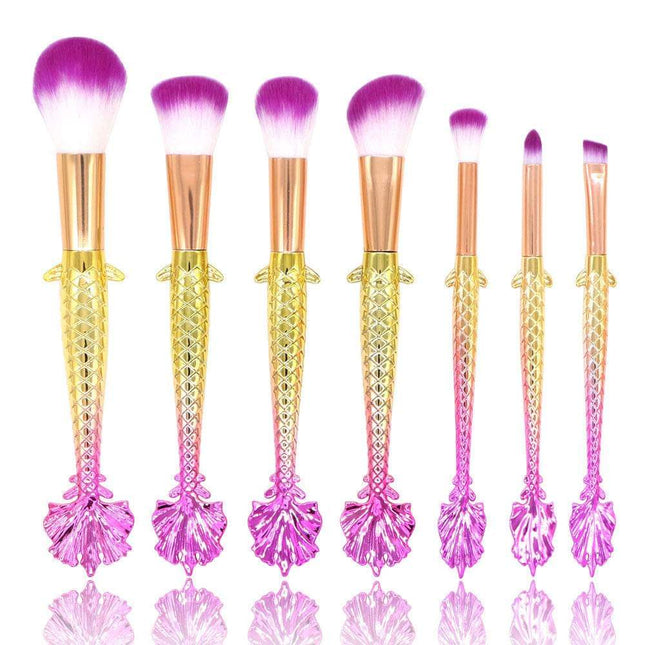 7-piece makeup brush set with yellow-green gradient handles and soft rayon bristles for versatile makeup application