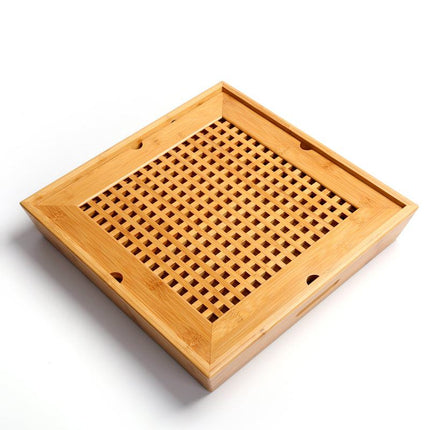 Minimalist bamboo tea tray on wooden table for home and office use