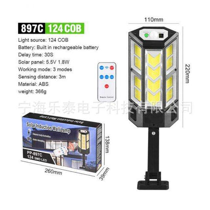 Outdoor solar wall light mounted on exterior wall with remote and motion sensor features