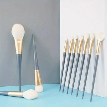 Set of 10 soft fluffy makeup brushes with blue travel pouch for smooth, streak-free application