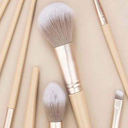 Premium 9-piece synthetic makeup brush set with durable ABS handles and aluminum ferrules in coffee and apricot colors for professional application
