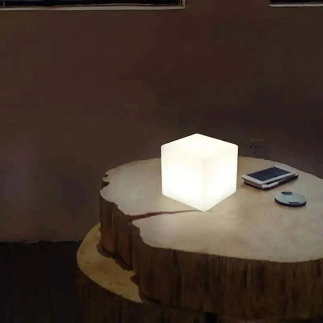 Rechargeable Cube LED Stool Table with remote control displaying colorful ambient lighting