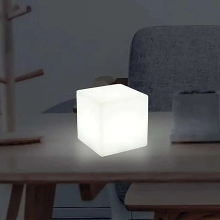 Rechargeable Cube LED Stool Table glowing in multiple colors with remote control and USB charging port