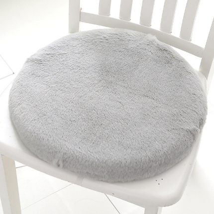 Plush faux fur memory foam cushion in blush pink for decorative home comfort