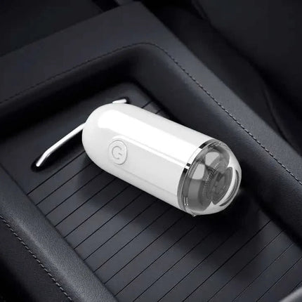 White electric mini shaver with floating cutter head, compact waterproof design, USB rechargeable, ideal for travel and quick touch-ups
