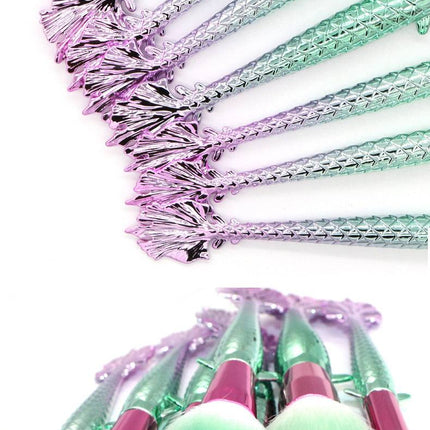 7-piece makeup brush set with yellow-green gradient handles and soft rayon bristles for versatile makeup application