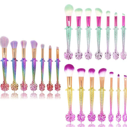 7-piece makeup brush set with yellow-green gradient handles and soft rayon bristles for precise makeup application