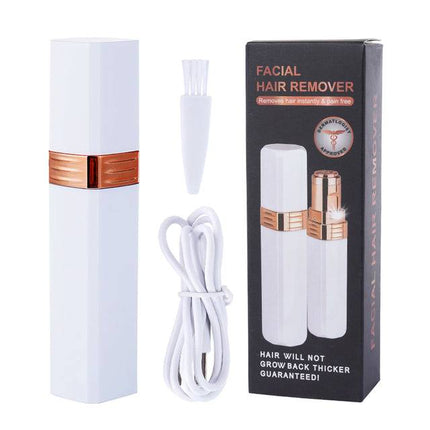 Compact dry battery lipstick shaving machine for women's hair removal and grooming.