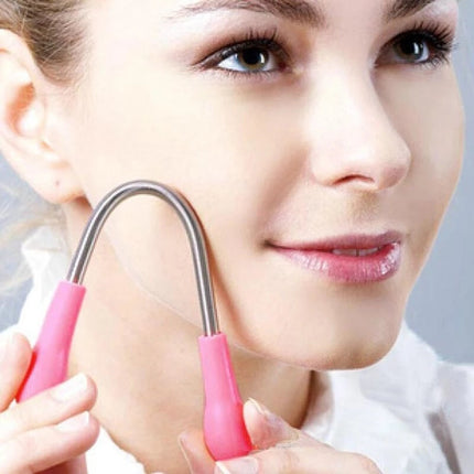 Reusable painless facial hair removal epilator tool in pink and black pistons