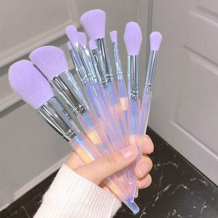 10-piece purple makeup brush set with synthetic fibers and storage bag for professional use