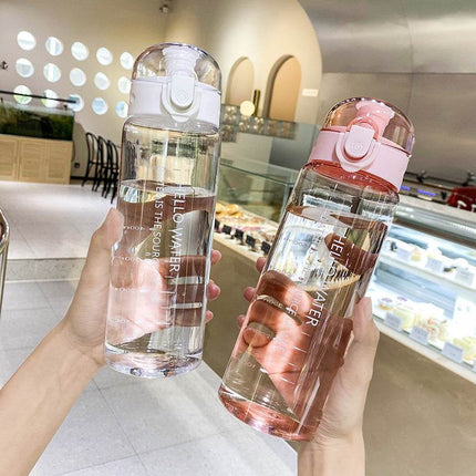 Leakproof portable water bottle with straw in white, pink, and blue colors, 780ml capacity