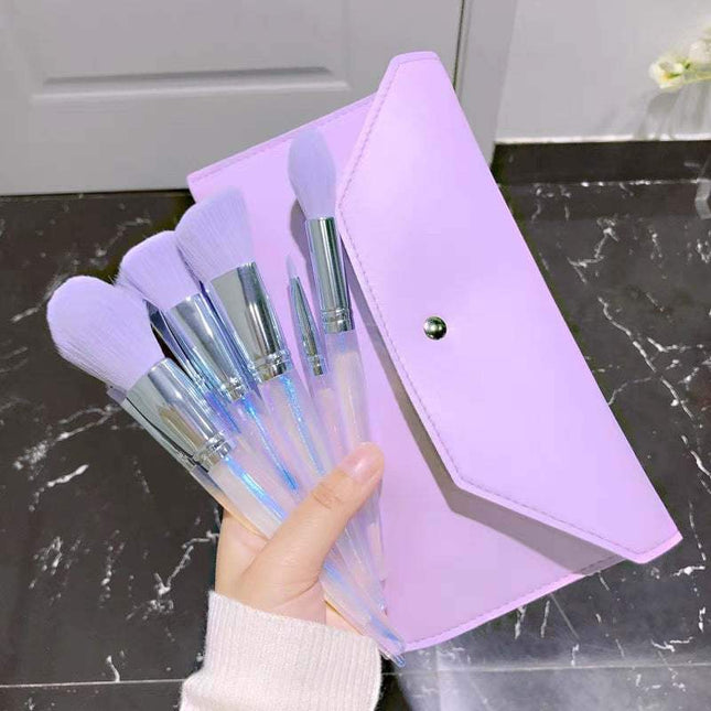 10-piece purple makeup brush set with synthetic fiber bristles and stylish storage bag