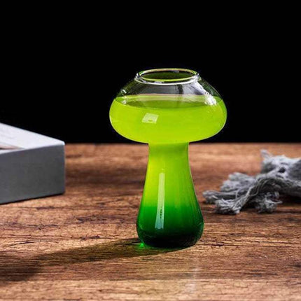 Cute mushroom cocktail glass with straw and whimsical design for drinks