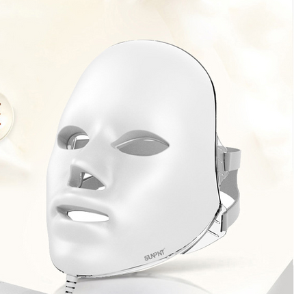 Compact home electronic whitening and rejuvenating beauty device with LED light therapy for skin brightening and anti-aging benefits