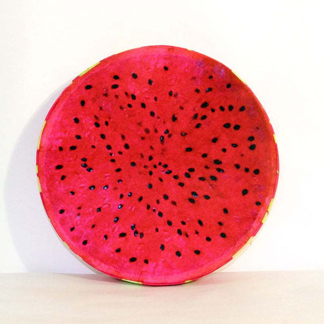 3D cute fruit plush pillow in watermelon and kiwi design on sofa