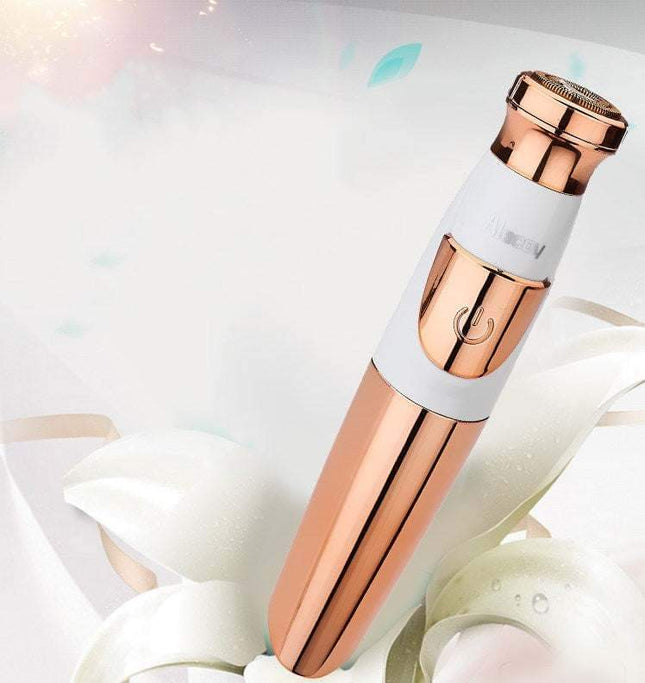 Compact lipstick-style electric hair remover for women with gold plating and dual power modes