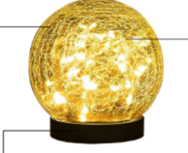 Solar Crackle Ball Light glowing warmly in a garden at night with solar panel charging in daylight