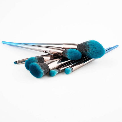 7-piece diamond makeup brush set in blue-black gradient with diamond-shaped handles and artificial fiber bristles