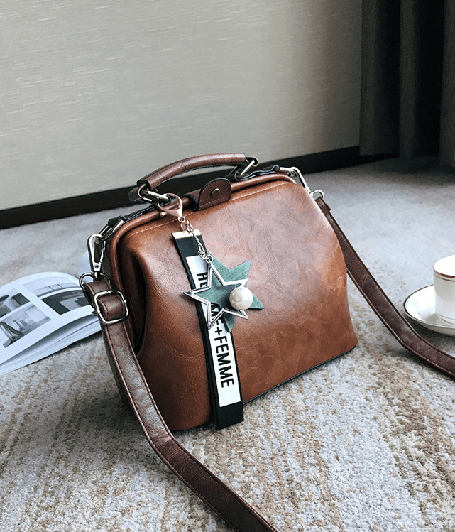 Stylish medium-sized PU doctor bag with adjustable shoulder strap and multiple compartments for daily use