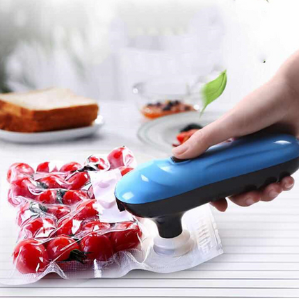 Compact vacuum sealing machine in gold color for food preservation and storage on kitchen countertop