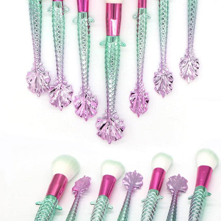 7-piece makeup brush set with yellow-green gradient handles and soft rayon bristles for precise makeup application