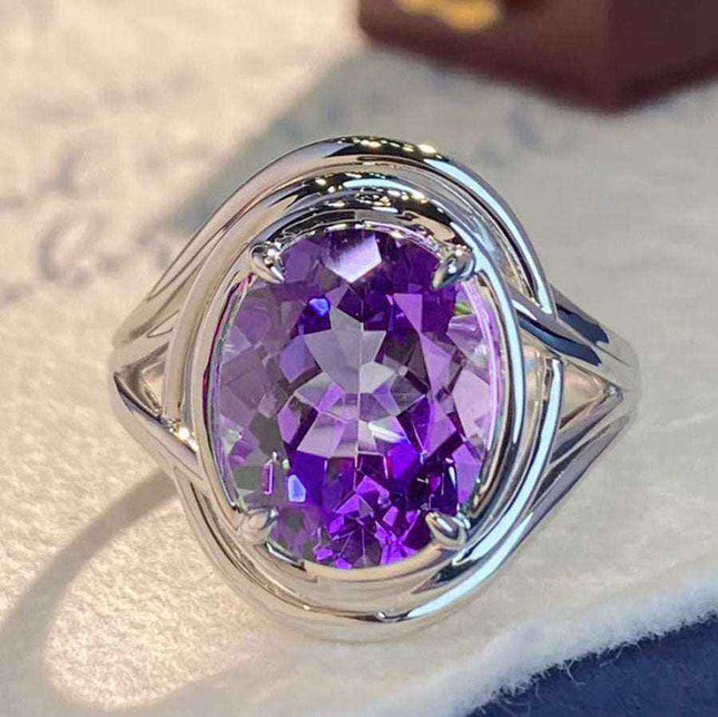 Fashion amethyst ring for women with purple diamond centerpiece and white gold finish