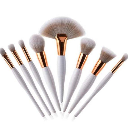 8-piece makeup brush set with black handles and silver tubes for professional makeup application